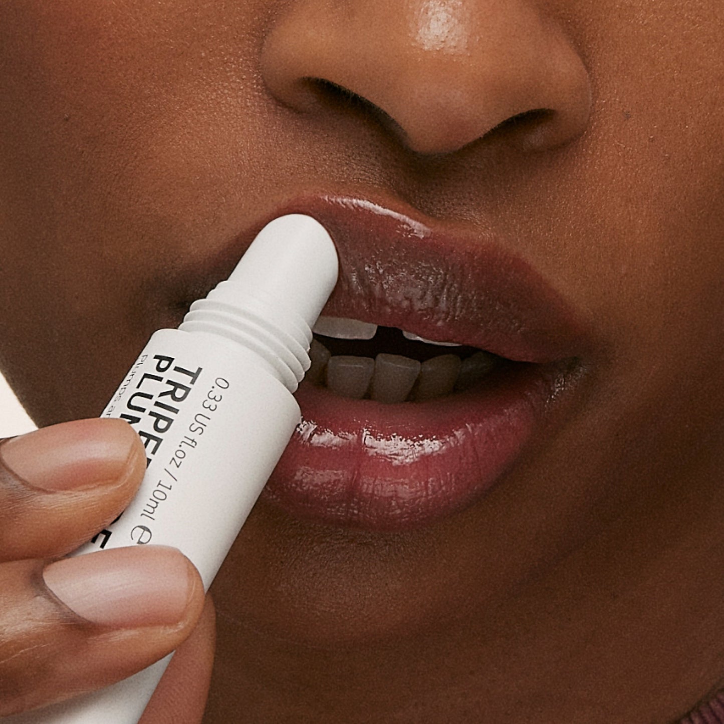 tripeptide-plumping-berry-lip-balm-f1 ApplicationBerry.jpg